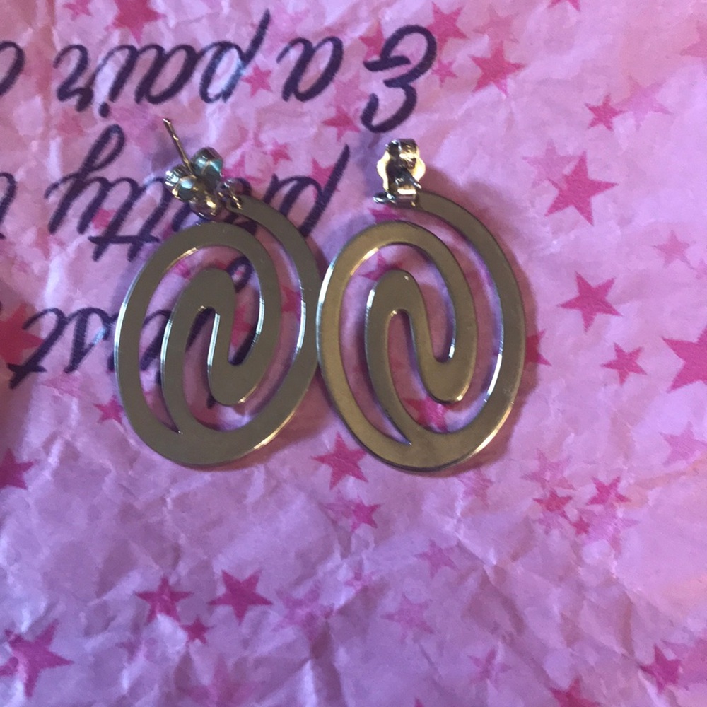 Silver pendant earrings.